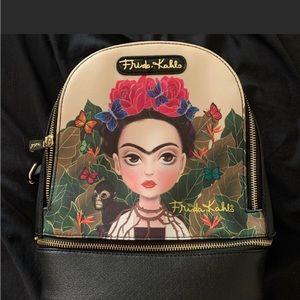 Frida Khalo backpack. New. Beautiful condition dust bag included.